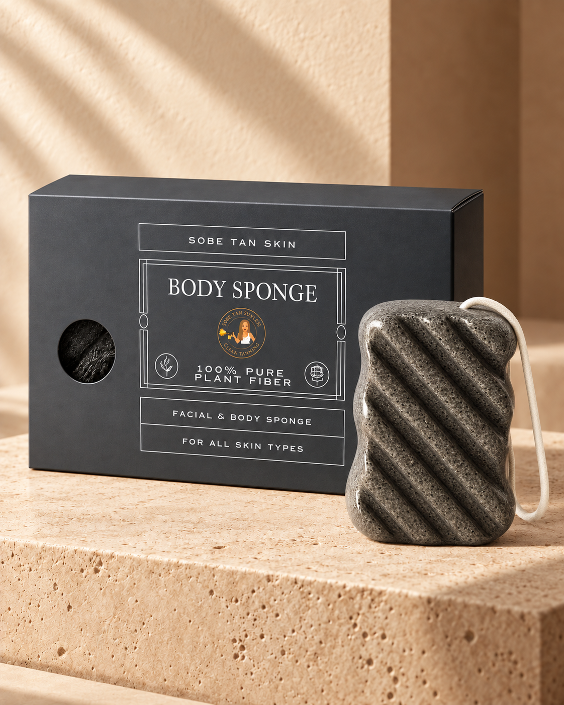 SoBe Tan plant fiber body sponge beside its retail box on warm stone