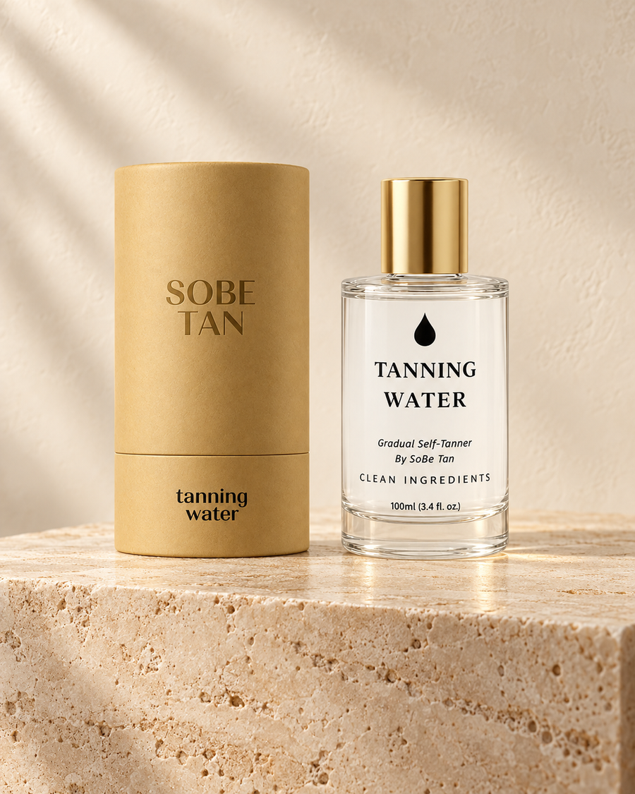 SoBe Tan Tanning Water bottle and kraft tube on warm travertine