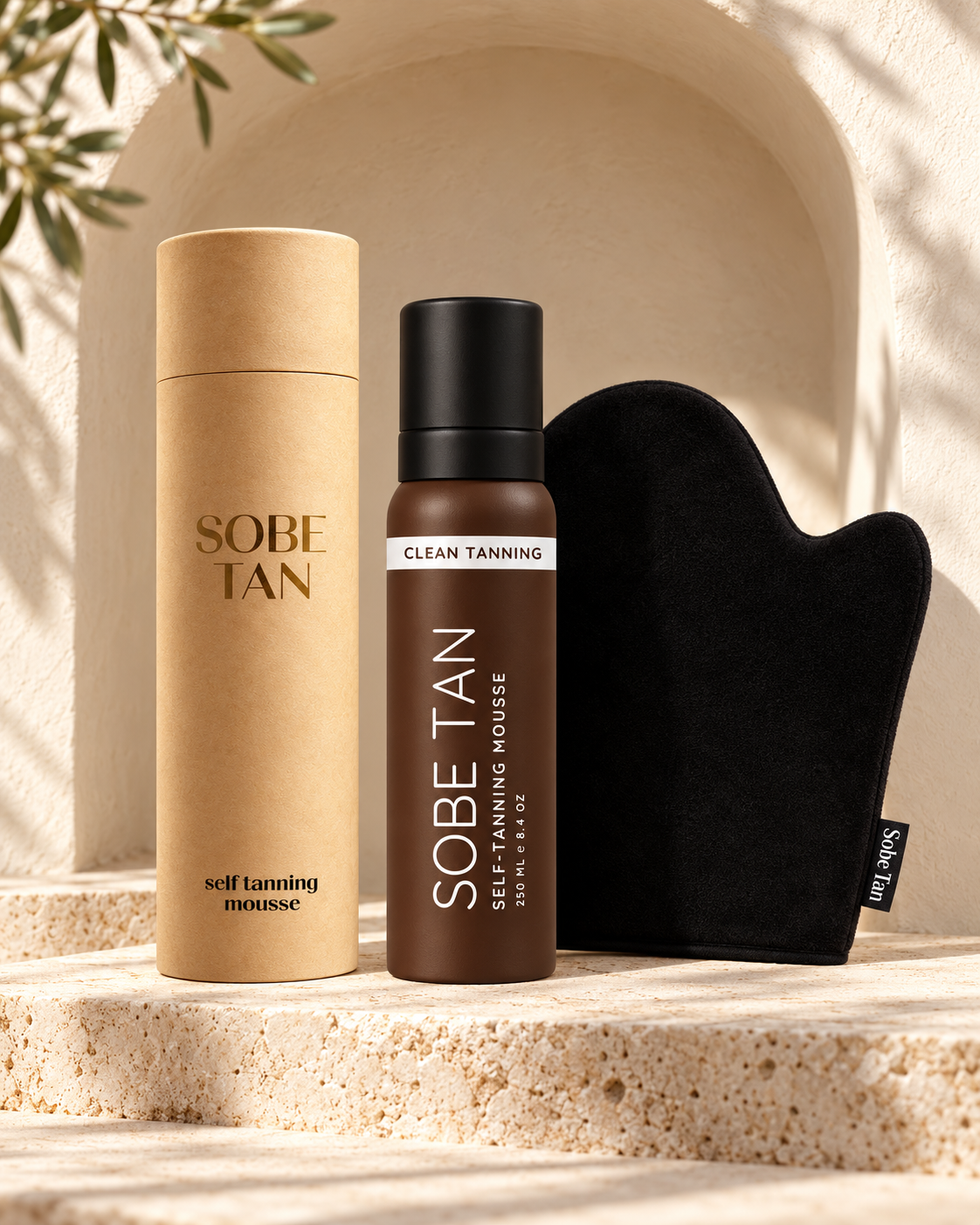 SoBe Tan self-tanning mousse bottle, kraft packaging tube and included applicator mitt